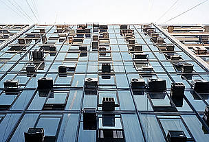 Air conditioning units on a high rise building. / &copy;: NiCoLaS LeViNToN
