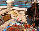 Tabarka, Tunisia.  Souvenirs and Red coral for sale. It might well be fake coral as the price is very low. Since antiquity Tabarka has been famous for its coral fishing and the Coral Festiva
