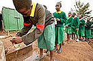 School girls filling water bottles at a water tap. Globally 1.1 billion people lack access to ... / ©: WWF-Canon / Martin HARVEY School girls filling water bottles at a water tap. Nairobi City, Kenya / ©: WWF-Canon / Martin HARVEY