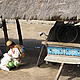 A woman and her cart in Kirisiasy © WWF / Moira Hough