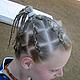 My Madagascar hairstyle, made by Marie-Helene (from the WWF Andapa staff) © WWF\ Corinne Eisenring
