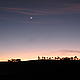 The sun sets behind some hills near Miarinavaratra © WWF / Moira Hough