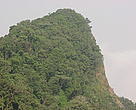 One of the many tips of Mount Kupe on a bright day