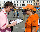 A suuporter shows his solidarity by signing the petition