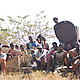 A group of villagers surrounding a disused water pump © WWF / Teo Lopez Bernal