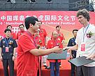 Chinese and Russian officials at the signing ceremony during the festival.