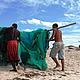 Carrying nets after fishing © WWF / Markos Zangas Tsakiris