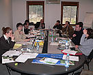 Members of the team Discussing current issues.