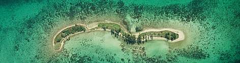Aerial view of coral reef at Laughing Bird Caye, Belize. / ©: Anthony B. RATH / WWF-Canon rel=