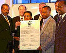 Cheif Executives of the companies to join WWF's Eastern Africa Corporate Club hold up a declaration stating their commitment to environmental conservation.