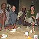 Eating with the king (at the side of the river). Madagascar. © Bette Harms