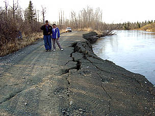 Riverbank erosion undermines a road. Unalakleet, Alaska. / &copy;: Native Village of Unalakleet