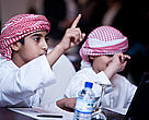 Enthusiastic youngsters at the Be’ati Watani launch familiarise themselves with the online course.