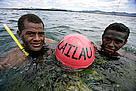 Village youths with a buoy that marks the boundary of the new marine protected area. Naduri, Fiji. / ©: Brent Stirton / Getty Images / WWF-UK Naduri village youths with the buoy that marks the boundary of the new marine protected area. / ©: Brent Stirton / Getty Images / WWF-UK