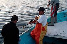 Fishermen pulling in a net