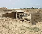 Damage to road structure caused by flooding of the Mekong River.