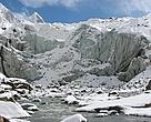 The cracking - and - retreating snout of Gangotri Glacier.  But smaller glaciers and significantly, their tributaries, are retreating faster in the face of climate change
