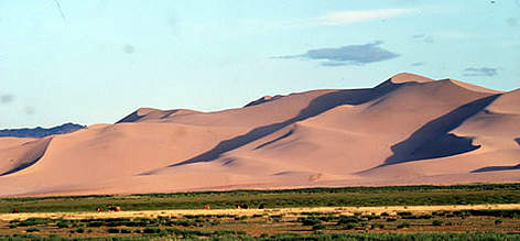 The The "singing sands" in the Gobi Desert Dunt Manchan, Mongolia. rel=