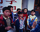 An environmental education specialist talks to children in Lixian Hunan Province, China.