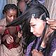 Having my hair plaited © WWF / Sonam Rabgye