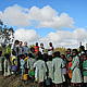 Planting trees with local students © WWF / Derek Ludlow