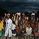 The local kids were fascinated by our cameras and loved to show off © WWF / Leon Brown