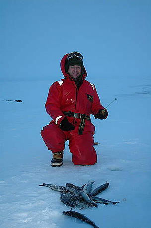Tom Arnbom and the catch of the day - arctic char. Chukotka, Russia. / ©: Viktor Nikiforov Tom Arnbom and the catch of the day - arctic char. Chukotka, Russia. / ©: Viktor Nikiforov
