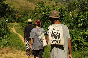 WWF agent Andrjy and Explorers Kuni and Ranto hiking in the Vondrozo Forest Corridor. Tanambao, ... / ©: WWF / Cara Brook / ©: WWF / Cara Brook