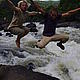 Jump photo! PCV Brian and Explorer Cara. Forest near Vohimary Nord, Madagascar © WWF / Cara Brook