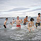 Voyage for the Future participants brave the chill and swim - in the freezing Arctic Ocean. © WWF