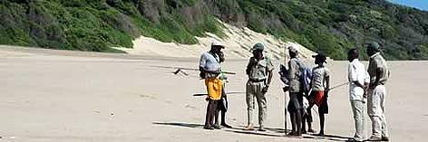Project Monitor July Ngubane inspects the catch. July flagged-down this group of fishermen to ... rel=