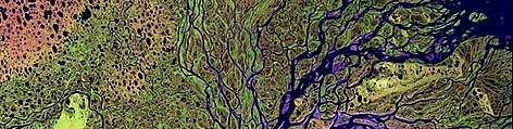 The Lena River, some 4,400 kilometres (2,800 miles) long, is one of the largest rivers in the ... / ©: NASA Landsat Project Science Office and USGS National Center for EROS rel=