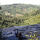 Jamila and I washing clothes atop a massive waterfall near Anarasoa, where we assisted in forest inventory © WWF / Elizabeth Johnson