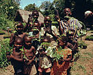 Join the Living Planet Club and play an important part in helping WWF achieve its conservation goals: Children present saplings from a WWF-funded nursery in the Udzungwa Mountains, Tanzania.