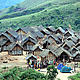 Setting up our tents in Iapombo with the help of the whole village. © Christa Szumski