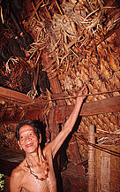 Alang Lip, Katu Chief, in whose ceremonial house trophies of the Giant muntjac, Troung Son muntjac, ... / &copy;: WWF-Canon / Elizabeth KEMF