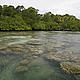 The crystal clear waters of © 2008 Richard Herrmann used with permission by Warner Bros. Entertainment Inc.