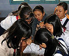 Students at Dinh Bo Linh secondary school are working in groups to draw the sea turtles from Con Dao. 