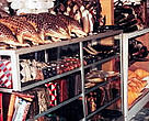A souvenir shop in Indonesia selling pangolins (top left).
