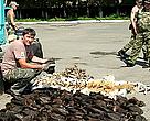 WWF officer ........... inspecting part of the haul from the well-executed Khanka Lake interception of smugglers by Russian far east authorities.