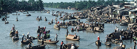 The Mekong River in Vietnam delta bustling in the early morning. / ©: WWF Greater Mekong rel=