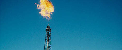 Burning off gas at an oil field Prudhoe Bay, Alaska, United States of America. / ©: WWF-Canon / Peter Prokosch Burning off gas at an oil field Prudhoe Bay, Alaska, United States of America. rel=
