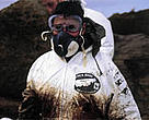 WWF-Spain volunteer cleaning up following the <I>Prestige</I> oil spill.