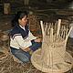 Rattan worker, Dan Lao factory © Bella Roscher, WWF