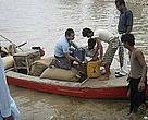 WWF staff delivering food and fodder to stranded villagers