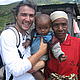 Me holding a baby with his grandma we met on the road to Anjialavabe, September 2006. © Corinne Eisenring