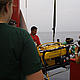 The ROV (remote operated vehicle) is lowered and is filmed by a Spanish television station. © WWF / Pilar Marcos