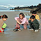 What are we leaving our future generations? Children in Galicia, Spain gather around a dead cormorant that has been washed onto a contaminated beach in the aftermath of the 'Prestige' oil spill. Despite public assurances by some politicians and oil companies that offshore oil exploration poses little risk these ongoing accidents continue to show that it is in fact extremely risky, and without ... © Jorge SIERRA / WWF-Canon