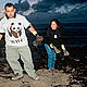 Volunteers from WWF/ADENA Spain collect fuel oil for analysis in the wake of the 'Prestige' oil spill, which is the largest environmental disaster in Spain's history. Cleaning up after an oil spill is regarded as a hazardous activity. Volunteers from the 'Prestige' and other spill clean-up operations were found to have respiratory, and central nervous system problems. © Jorge SIERRA / WWF-Canon