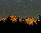 Star trail in the night sky, Cheile Bicazului-Hasmas National Park, Carpathians, Transylvania, Romania.